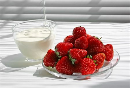 simsearch:400-05891431,k - Plate with berries of a fresh strawberry and a cup with yoghurt (sour cream) Stock Photo - Budget Royalty-Free & Subscription, Code: 400-04702756