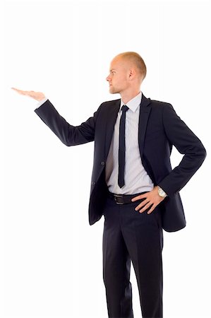 Young man showing something on his hand over white Stock Photo - Budget Royalty-Free & Subscription, Code: 400-04702856