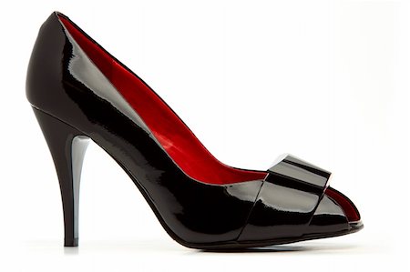simsearch:400-06070695,k - Classical black female shoe with a buckle on white background Foto de stock - Super Valor sin royalties y Suscripción, Código: 400-04702909