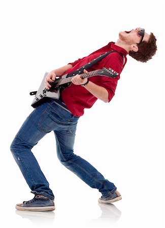 side view of a passionate guitarist playing his electric guitar on white background Stock Photo - Budget Royalty-Free & Subscription, Code: 400-04702934