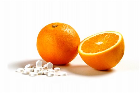 simsearch:400-06513460,k - A cut in half orange next to vitamin C tablets Stock Photo - Budget Royalty-Free & Subscription, Code: 400-04716149