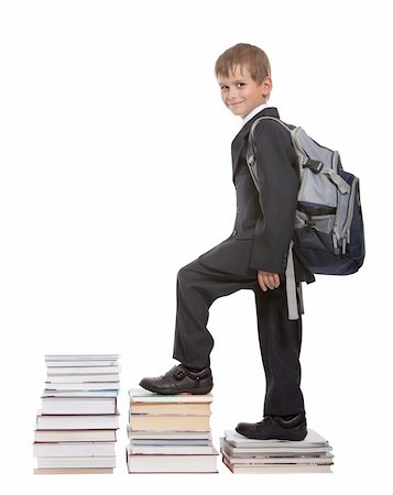 Education success graph - successful schoolboy isolated on white background Stock Photo - Budget Royalty-Free & Subscription, Code: 400-04716782
