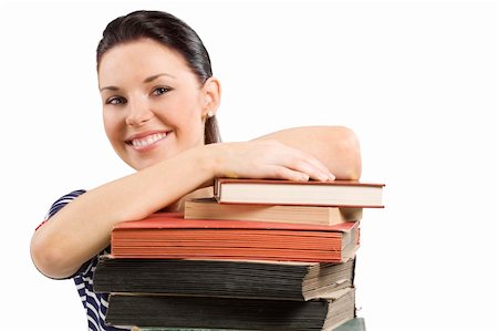 simsearch:400-04860880,k - close up portrait of smiling cute girlstaying over a pile of old books Stock Photo - Budget Royalty-Free & Subscription, Code: 400-04717333