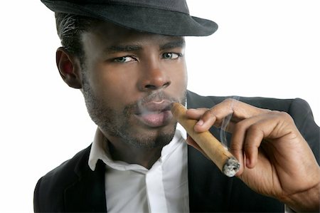 simsearch:400-04131198,k - African american man smoking cigar portrait with black hat Stock Photo - Budget Royalty-Free & Subscription, Code: 400-04718050