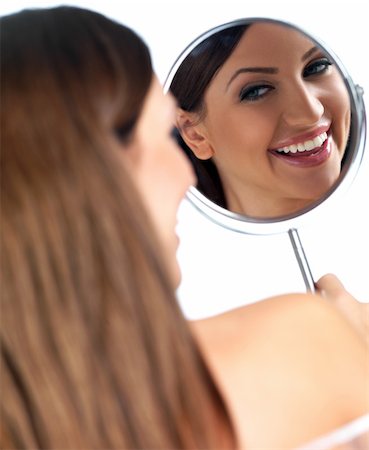 simsearch:400-04754019,k - Portrait of beautiful woman, she is looking at the mirror Stock Photo - Budget Royalty-Free & Subscription, Code: 400-04718388