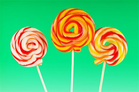 simsearch:400-04718619,k - Colourful lollipop against the colourful background Foto de stock - Super Valor sin royalties y Suscripción, Código: 400-04718620