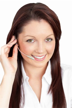 simsearch:400-05287143,k - Merry young businesswoman wearing headphones against a white background Stock Photo - Budget Royalty-Free & Subscription, Code: 400-04719965