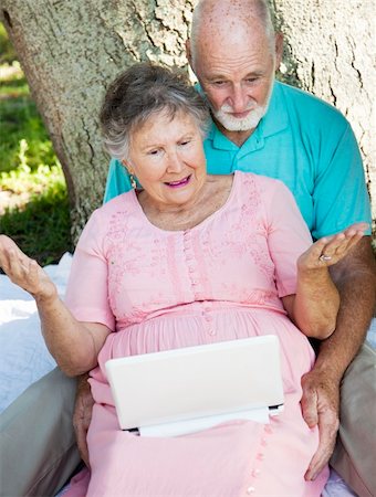 simsearch:400-04208630,k - Seniors on 3G network are frustrated with their netbook computer. Stock Photo - Budget Royalty-Free & Subscription, Code: 400-04710129