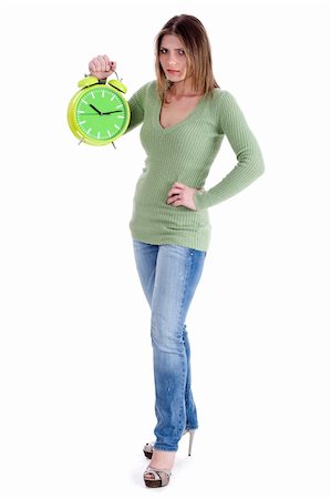 simsearch:400-04158321,k - attractive young model holding the clock on white background Stock Photo - Budget Royalty-Free & Subscription, Code: 400-04710245