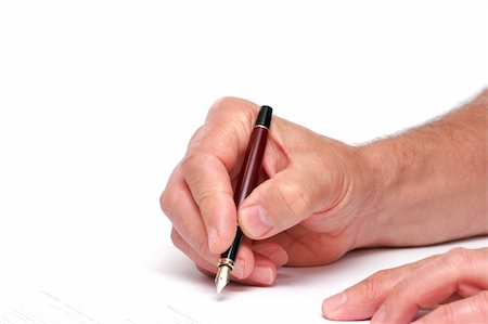 someone signing a document  with a fountain pen isolated on a white background Stock Photo - Budget Royalty-Free & Subscription, Code: 400-04710478