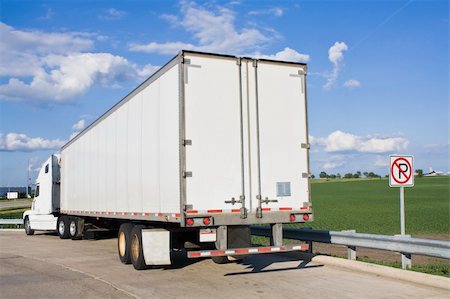 semi truck car carriers - White Semi-Truck parked in forbidden spot. Stock Photo - Budget Royalty-Free & Subscription, Code: 400-04711255