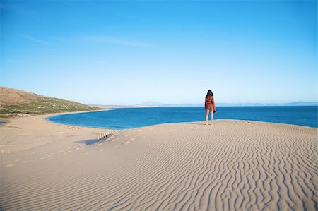 woman at sand dune in spain with african horizon Stock Photo - Budget Royalty-Free & Subscription, Code: 400-04712088