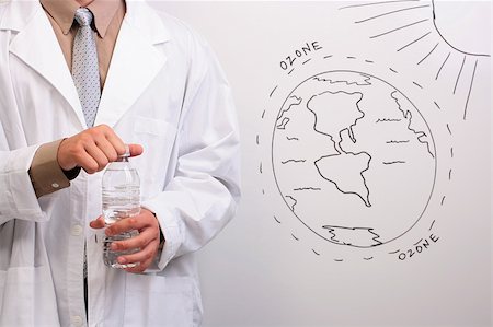 pictures man opening bottle - Man in a white lab coat opening a bottle of water while standing next to a drawing of the ozone layer. Stock Photo - Budget Royalty-Free & Subscription, Code: 400-04713069