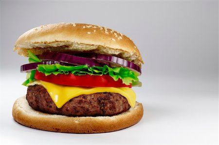 simsearch:400-06090558,k - A fresh cheeseburger on gray background. Stock Photo - Budget Royalty-Free & Subscription, Code: 400-04726229