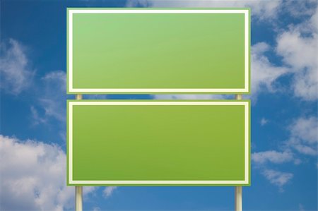 ramps on the road - Double green sign in front of a blue sky (insert your own text) Stock Photo - Budget Royalty-Free & Subscription, Code: 400-04726920