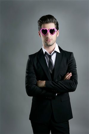 formal man model - funny heart shape pink sunglasses modern fashion businessman Stock Photo - Budget Royalty-Free & Subscription, Code: 400-04727137