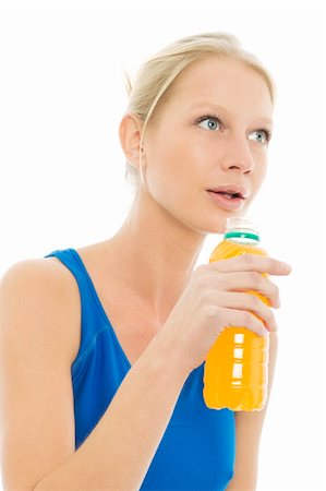 simsearch:400-04398921,k - portrait of a young caucasian woman wearing a sports blue vest and drinks a bottle of energy drinks Stock Photo - Budget Royalty-Free & Subscription, Code: 400-04729238