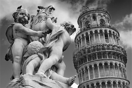 simsearch:400-05369313,k - Leaning tower and statue angel in Pisa, Tuscany, Italy Stock Photo - Budget Royalty-Free & Subscription, Code: 400-04720861
