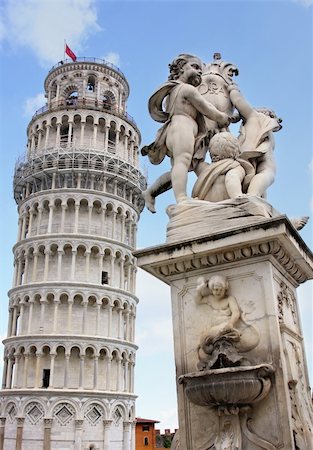 simsearch:400-05369313,k - Leaning tower and statue angel in Pisa, Tuscany, Italy Stock Photo - Budget Royalty-Free & Subscription, Code: 400-04720862