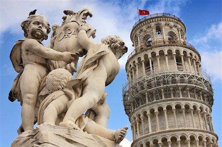 simsearch:400-05369313,k - Leaning tower and statue angel in Pisa, Tuscany, Italy Stock Photo - Budget Royalty-Free & Subscription, Code: 400-04720863