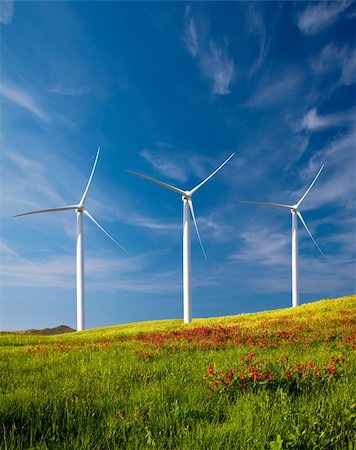 simsearch:400-05319608,k - Beautiful green meadow with Wind turbines generating electricity Stock Photo - Budget Royalty-Free & Subscription, Code: 400-04721565