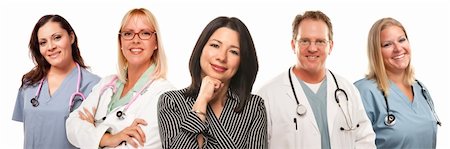 Beautiful Hispanic Woman with Male and Female Doctors or Nurses Isolated on a White Background. Stock Photo - Budget Royalty-Free & Subscription, Code: 400-04721731