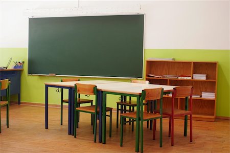 pupil in a empty classroom - image of a classroom with desks arranged in groups Stock Photo - Budget Royalty-Free & Subscription, Code: 400-04723276