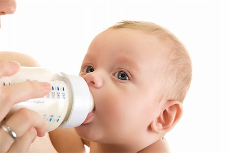 simsearch:400-06751007,k - Mother give drink her baby boy by feeding bottle Stock Photo - Budget Royalty-Free & Subscription, Code: 400-04723760