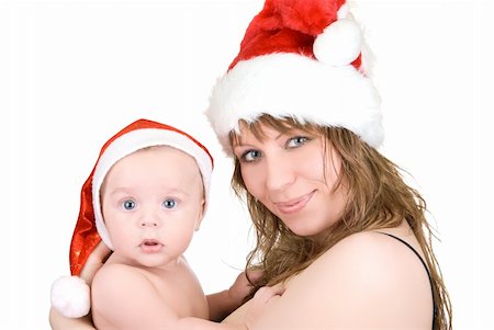 Beautiful mommy santa and her baby Santa boy on a white Stock Photo - Budget Royalty-Free & Subscription, Code: 400-04723798