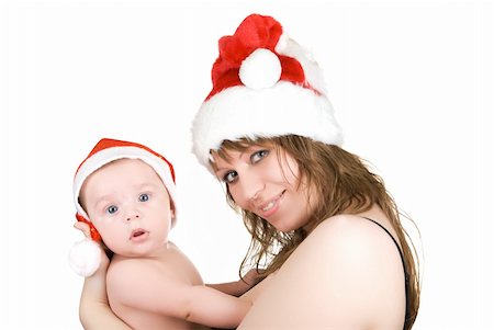 Pretty mommy santa and her baby Santa boy on a white Stock Photo - Budget Royalty-Free & Subscription, Code: 400-04723799