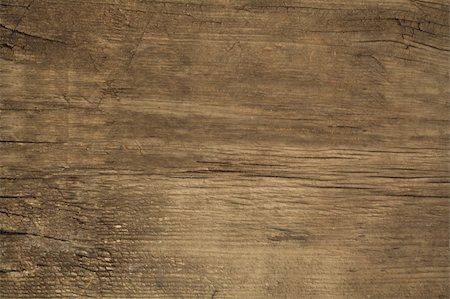 The texture of the old wood. Natural old embossed wooden surface, age over 20 years, covered with stains. Not an imitation Stock Photo - Budget Royalty-Free & Subscription, Code: 400-04734652