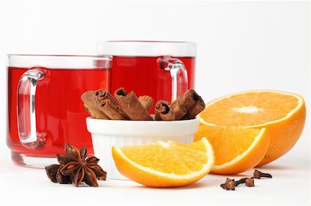 Mulled wine with oranges, cinnamon, anise and clove on white background Stock Photo - Budget Royalty-Free & Subscription, Code: 400-04736073