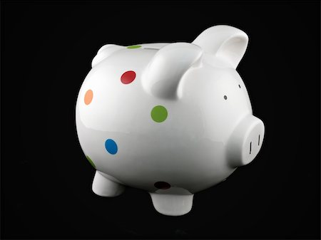 simsearch:400-06077471,k - A piggy bank isolated against a black background Stock Photo - Budget Royalty-Free & Subscription, Code: 400-04736271