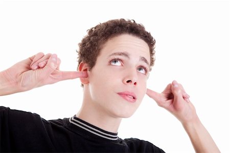 Young man, holding fingers in his ears, bored, not listening, on white, studio shot Stock Photo - Budget Royalty-Free & Subscription, Code: 400-04736570