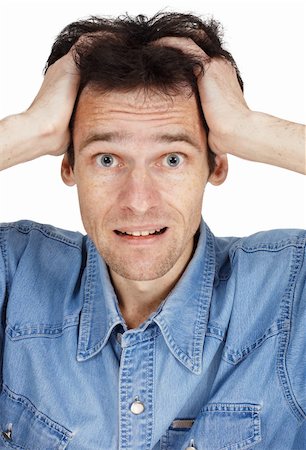 simsearch:400-04748544,k - The confused young man has clasped hands a head isolated on white Stock Photo - Budget Royalty-Free & Subscription, Code: 400-04737219