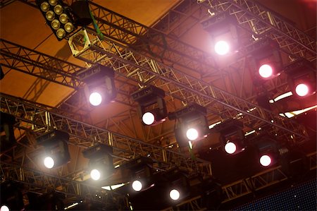 simsearch:632-05604064,k - a stage light rack with spotlights shining down ,selective focus Stock Photo - Budget Royalty-Free & Subscription, Code: 400-04737438