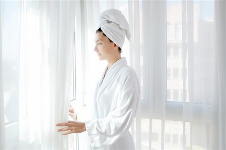 simsearch:400-04335125,k - Bathrobe happy woman sunny hotel window white curtains Stock Photo - Budget Royalty-Free & Subscription, Code: 400-04738468