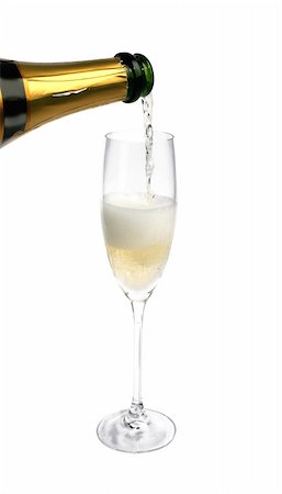 simsearch:400-04226436,k - sparkling white wine pour in glass isolated on white background Stock Photo - Budget Royalty-Free & Subscription, Code: 400-04738774