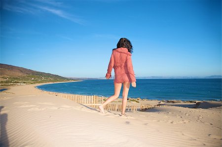 woman at sand dune in spain with african horizon Stock Photo - Budget Royalty-Free & Subscription, Code: 400-04739122
