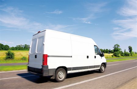 semi truck car carriers - White delivery mini truck on highway over blue sky. Stock Photo - Budget Royalty-Free & Subscription, Code: 400-04739200