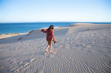 woman at sand dune in spain with african horizon Stock Photo - Budget Royalty-Free & Subscription, Code: 400-04739488