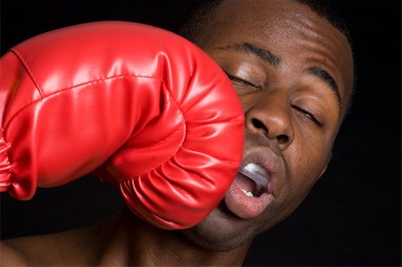 Boxing man getting punched Foto de stock - Super Valor sin royalties y Suscripción, Código: 400-04739761