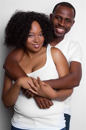 simsearch:400-04739802,k - Loving black couple hugging Stock Photo - Budget Royalty-Free & Subscription, Code: 400-04739801