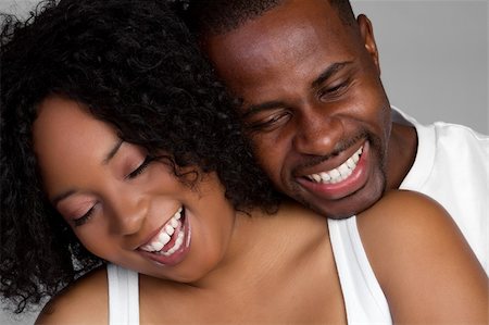 simsearch:400-04739802,k - Happy laughing black couple Stock Photo - Budget Royalty-Free & Subscription, Code: 400-04739803