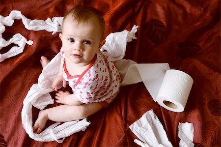 Down shot of naughty surprised baby found tearing up toilet roll Stock Photo - Budget Royalty-Free & Subscription, Code: 400-04730854