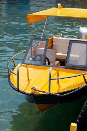 simsearch:400-04433053,k - Yellow boat tied up dock Stock Photo - Budget Royalty-Free & Subscription, Code: 400-04731484