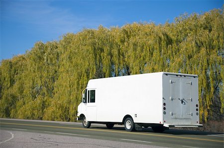 semi car transporter - Small white truck on the road. Stock Photo - Budget Royalty-Free & Subscription, Code: 400-04747619