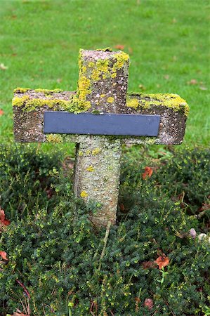 simsearch:400-04032243,k - crosses at cemetery in autumn mist stone tombstones Stock Photo - Budget Royalty-Free & Subscription, Code: 400-04749441
