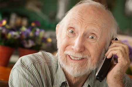 phone one person adult smile elderly - Senior man at home on the telephone Stock Photo - Budget Royalty-Free & Subscription, Code: 400-04749660