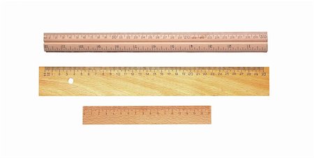 Measuring wooden rulers isolated on white background Photographie de stock - Aubaine LD & Abonnement, Code: 400-04740253